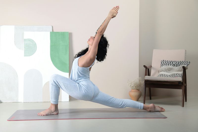 Woman practicing yoga in a calm indoor setting